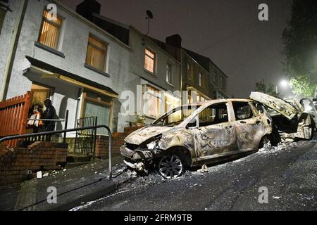 The aftermath of a riot in the Mayhill area of Swansea, which saw police attacked and several cars in the area torched during large scale disorder on the council estate. It is believed locals reacted when police turned up to a memorial that was taking place for a local man who had recently died. Stock Photo