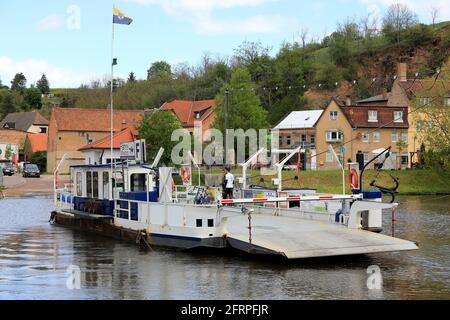 Wettin, Germany. 16th May, 2021. The yaw ferry 'Wettin' sails across the river Saale. Wettin is the ancestral castle of the Wettins, the margraves, electors and kings of Saxony. Idyllically situated in the Lower Saale Valley Nature Park, the town is a popular destination in the region. Credit: Peter Gercke/dpa-Zentralbild/ZB/dpa/Alamy Live News Stock Photo
