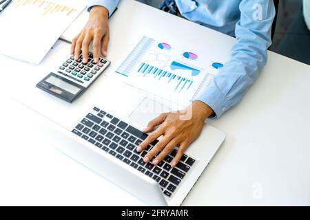 In office businessman in meeting analysis chart graphy marketing plan in business Stock Photo