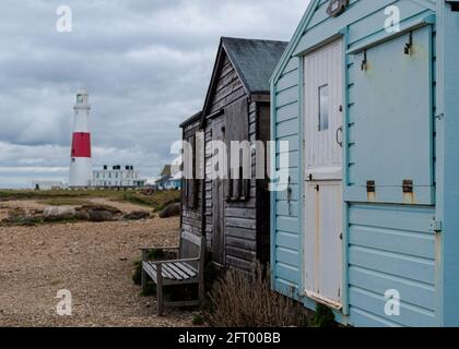 The fishermen's beach huts at Portland Bill Lighthouse, Dorset Stock Photo