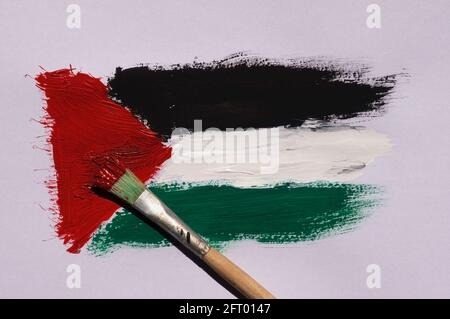 Brush painting of Palestine flag on a paper for background and wallpaper, selected focus. Stock Photo