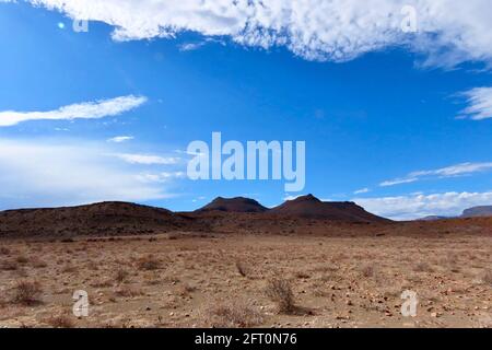 Con trails in the frigid air over Great Karoo Stock Photo
