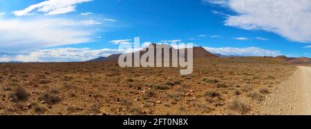 The road less traveled winding through the Great Karoo Stock Photo