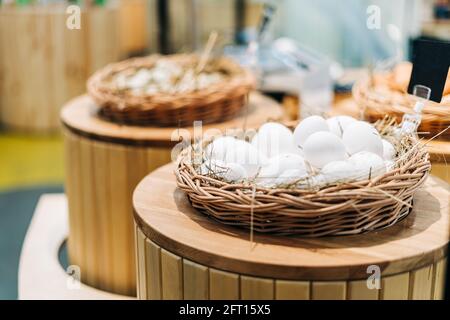 Quail eggs in bird nest. Happy easter. Rustic style. Healthy, organic food. Stock Photo
