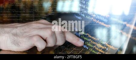 finger click on laptop. internet technologies concept business front-end developing banner. mixed media Stock Photo