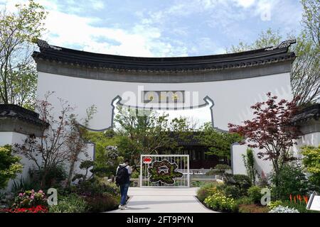 Shanghai. 21st May, 2021. Photo taken on May 21, 2021 shows a corner of the Jiangsu garden of the 10th China Flower Expo in Chongming District, east China's Shanghai. The 10th China Flower Expo, which covers a total area of 589 hectares, kicked off here on Friday and is expected to conclude on July 2. Credit: Ding Ting/Xinhua/Alamy Live News Stock Photo