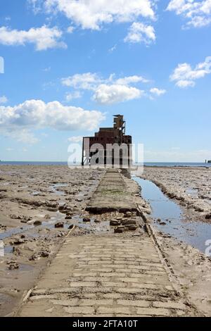 Causeway to Grain Tower Battery on the Medway Estuary Kent Stock Photo