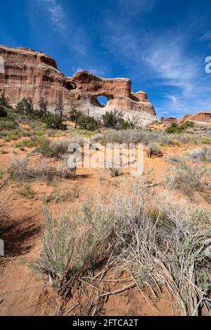 Pine Tree Arch along the Devils Garden hiking trail in Arches National Park Utah Stock Photo