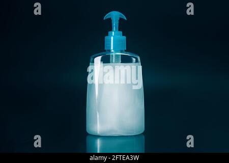 Hand sanitizer on a black background. photo with a copy-space. Stock Photo