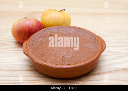 quince or apple sauce on the table Stock Photo