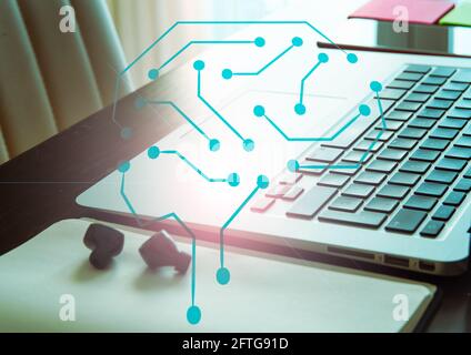 Brain over laptop. Intelligence and technology use concept Stock Photo