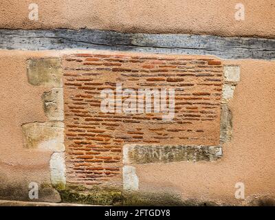 Old 18th century blocked former shop window and doorway - Le Blanc, Indre (36), France. Stock Photo