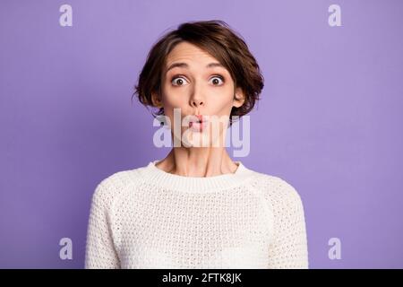 Photo of nice hairdo person staring shocked mouth lips wearing sweater isolated on violet color background Stock Photo