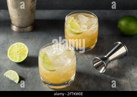 Refreshing Cold Rum Canchanchara Cocktail with Lime and Honey Syrup Stock Photo