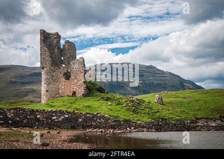 A summer 3 shot HDR image of Ardvreck Castle on the shores of Loch Assynt, Sutherland in the Highlands of Scotland. 27 May 2014 Stock Photo