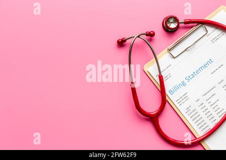 Stethoscope with medical billing statement. Top view Stock Photo