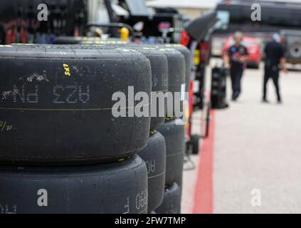 Austin. 21st May, 2021. Stacks of tires wait near the working area for NASCAR Camping World Truck Series driver John Hunter Nemechek (4) during NASCAR Camping World Truck Series practice at Circuit of the Americas in Austin, Texas, on May 21, 2021. Credit: Scott Coleman/ZUMA Wire/Alamy Live News Stock Photo