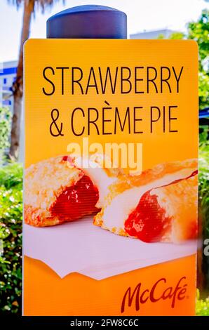 A sign advertises strawberry and creme pie at the McDonald’s drive-thru on Highway 90, May 8, 2021, in Biloxi, Mississippi. The strawberry & creme pie Stock Photo
