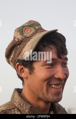 Uyghur young man at the Sunday Kashgar market, Xinkiang, Popular Republic of China, 2019 Stock Photo