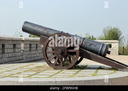 An ancient cannon at the top of an ancient fortress located in Wolmido, Incheon Korea Stock Photo