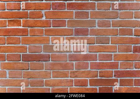 Red rustic brick wall - high quality texture. Background for your projects and creative work. Stock Photo