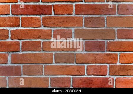 Red rustic brick wall - high quality texture. Background for your projects and creative work. Stock Photo