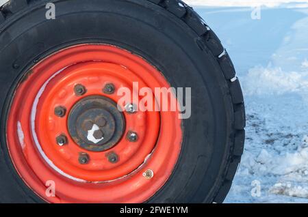 Car Tires on a snow-covered winter road Stock Photo