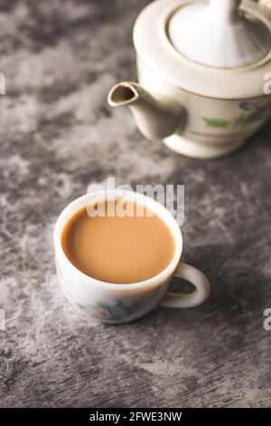 Indian chai in glass cups with metal kettle and other masalas to make the  tea Stock Photo - Alamy