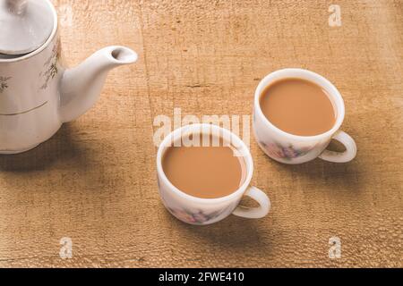 Indian chai in glass cups with metal kettle and other masalas to make the  tea Stock Photo - Alamy