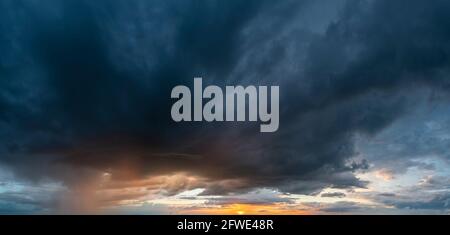 storm clouds at sunset Stock Photo