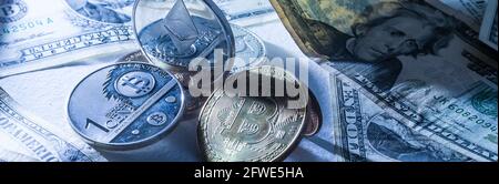 Golden Bitcoins on US dollars. Electronic money exchange concept Stock Photo
