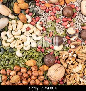 various edible nuts and seeds close up Stock Photo