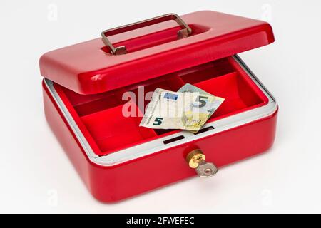 Cash box with little cash Stock Photo