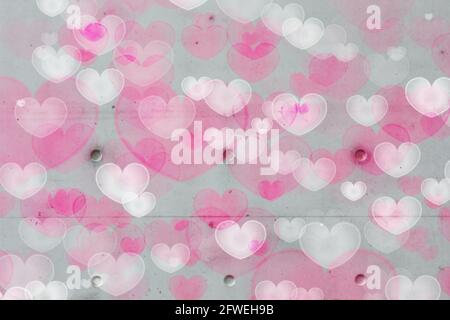 Background hearts white pink concrete wall Stock Photo