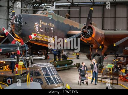 Barbara Weatherill (left), who served in the anti-aircraft command of the Royal Artillery during World War II, chats to Yorkshire Air Museum's Managing Director Barbara George (right) as they walk through a new display at the Yorkshire Air Museum in Elvington, that opened to the public today for the first time following the further easing of lockdown restrictions in England. Picture date: Saturday May 22, 2021. Stock Photo