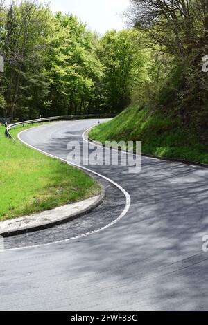 twisted Eifel road in spring Stock Photo