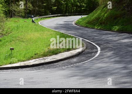 twisted Eifel road in spring Stock Photo