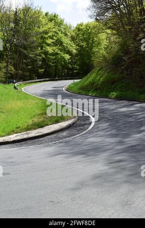 twisted Eifel road in spring Stock Photo