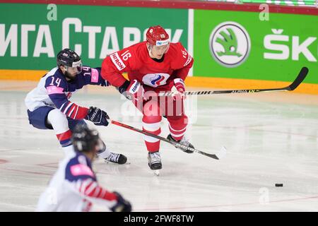 22.05.2021, Riga, Olympic Sports Centre, Great Britain vs Russia (2021 IIHF Ice Hockey World Championship), #16 Nikita Zadorov (Russia) fight with #14 Liam Kirk (Great Britain) for the puck (Switzerland/Croatia OUT) Stock Photo