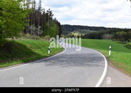 twisted Eifel road in spring Stock Photo
