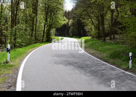 twisted Eifel road in spring Stock Photo