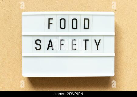 Lightbox with word food safety on wood background Stock Photo