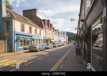 Dunkeld, Scotland - August 15 2016: The quaint main shopping high street of the Scottish town and village of Dunkeld and Birnam in Perth and Kinross. Stock Photo