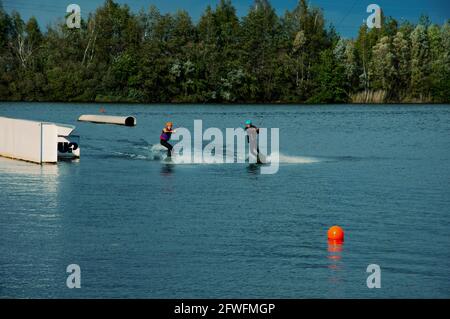 Terhills Cablepark Amusement Park. Wakeboard. A man water skiing on a lake