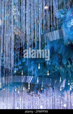 Modern wedding scene, blue glass crystal lamp ceiling Stock Photo