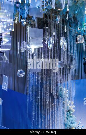 Modern wedding scene, blue glass crystal lamp ceiling Stock Photo