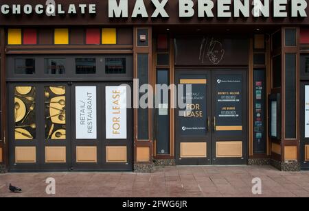 The Boylston street view of the former Max Brenner Boston café, Max Brenner is a small upscale international chain known for its Chocolate bar and café. Max Brenner in central Boston’s Back Bay closed after ten years on Boylston Street.  According to the Massachusetts Restaurant Association 23% or 3,400 restaurants have permanently closed during the pandemic. Stock Photo