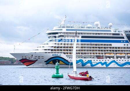 Kiel, Germany. 22nd May, 2021. The Aida cruise ship 'AIDAsol' leaves port. The crisis-ridden cruise industry starts the season after several months of corona break in Germany. (to dpa 'Aida opens cruise season from Kiel with Baltic Sea tour') Credit: Daniel Bockwoldt/dpa/Alamy Live News Stock Photo