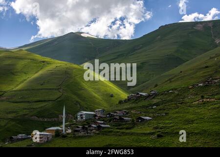 An image of houses positioned on mountains where nature gushes from the bosom. Turkey, Black Sea Region. Stock Photo