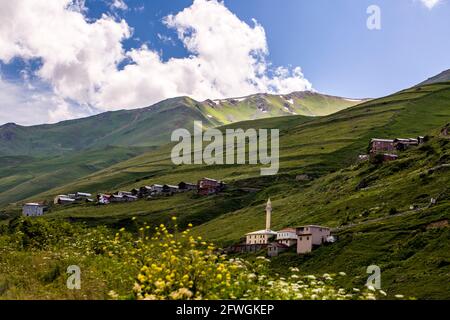 An image of houses positioned on mountains where nature gushes from the bosom. Turkey, Black Sea Region. Stock Photo